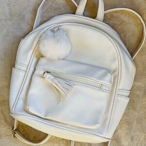 Elegant White Backpack with Tassel